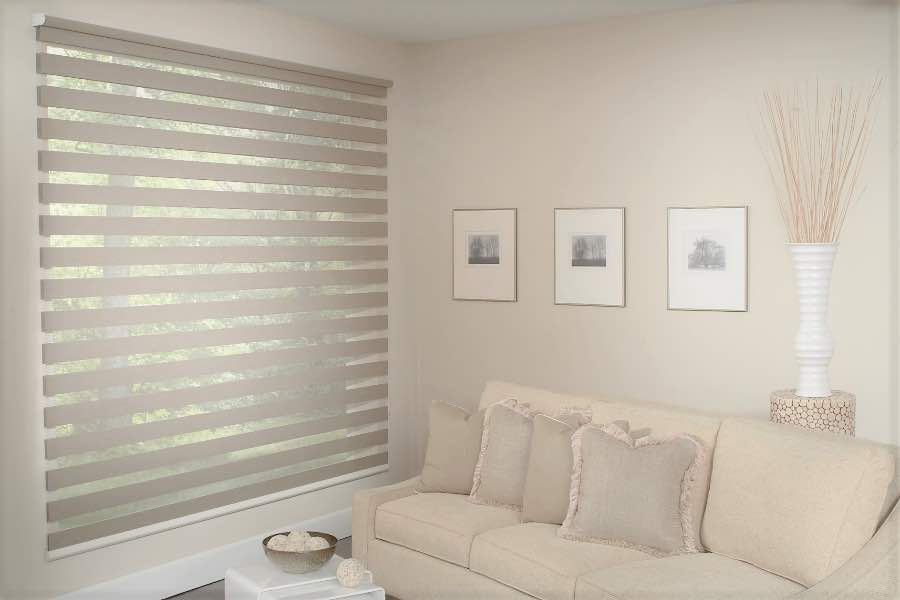 Zebra shades give you a unique combination of light control and style that benefits your Fort Myers home. Zebra shade allows filtered light into a living room
