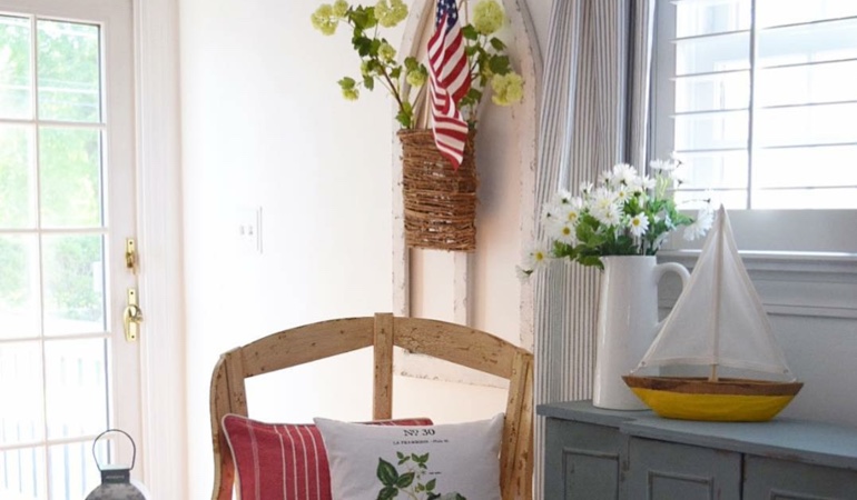 Bright sitting corner with faux wood plantation shutters in Fort Myers. Faux wood plantation shutters in Fort Myers