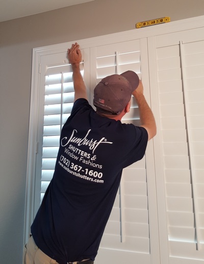 Shutter installation in Fort Myers bedroom.