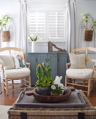 Interior shutters in airy sunroom.