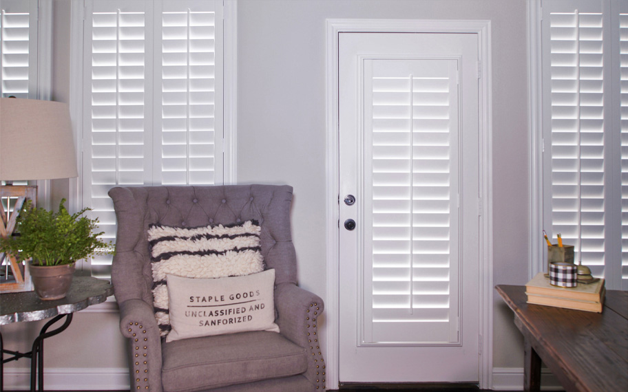 Interior shutters are beautiful and durable window treatments for glass doors in Fort Myers. Polywood shutters on a door