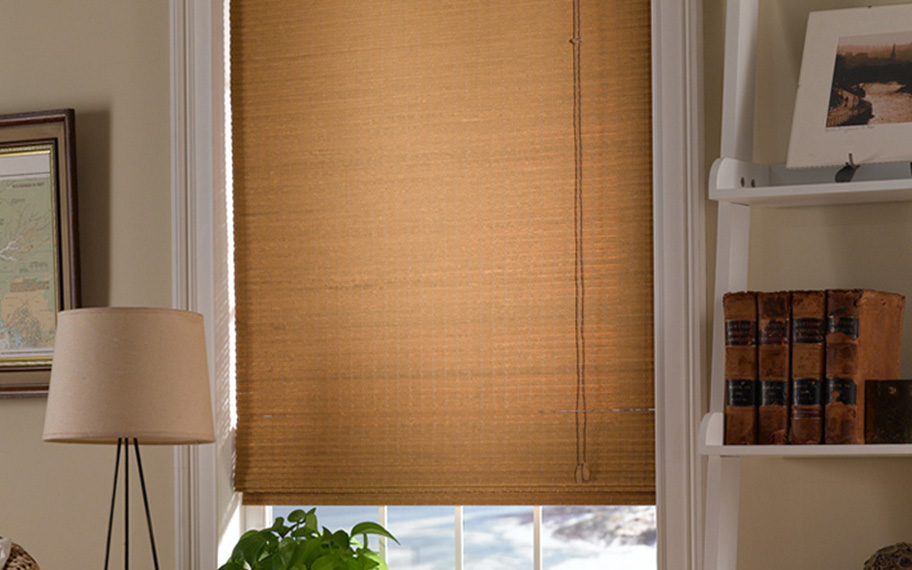 Add a touch of nature to your decor with woven fiber shades in Fort Myers. Tan woven fiber shades in a living room