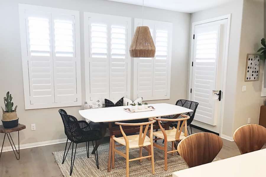 Use Polywood shutters to control natural light levels in your Fort Myers dining room. Polywood shutters with top louvers tilted open in a dining room