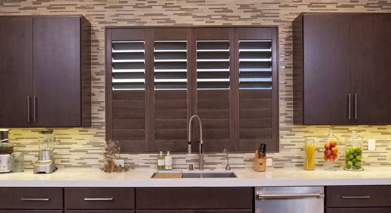 Divider rail shutters in a Fort Myers kitchen. Fort Myers cafe kitchen shutters