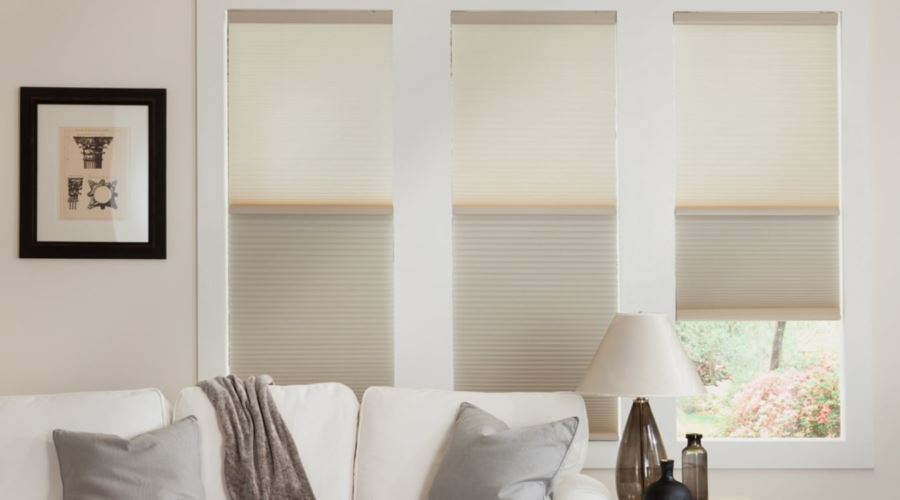 Cellular shades are energy efficient and stop air from entering through your window. Cellular shades in a Fort Myers living room
