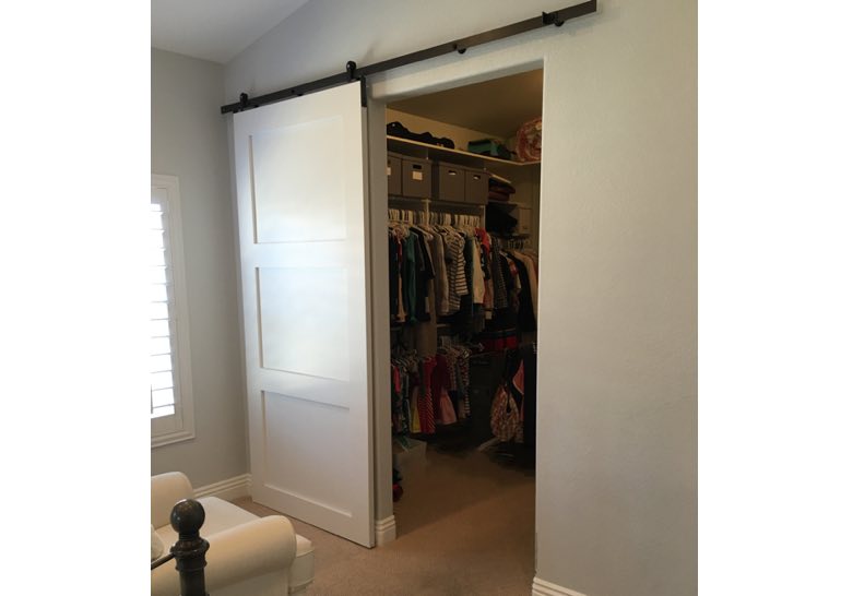 White wooden sliding barn door