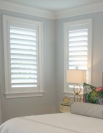 Hidden tilt rod shutters open. Plantation shutters with hidden tilt rods in Fort Myers