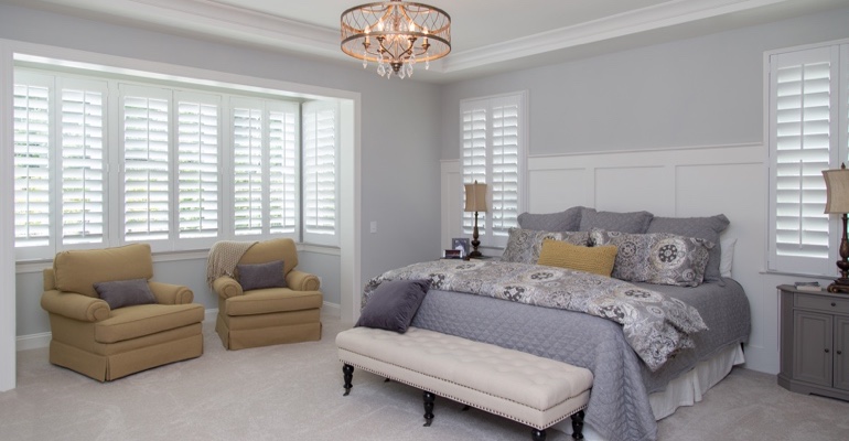 Indoor shutters offer subtle fashion. Interior shutters in Fort Myers bedroom.