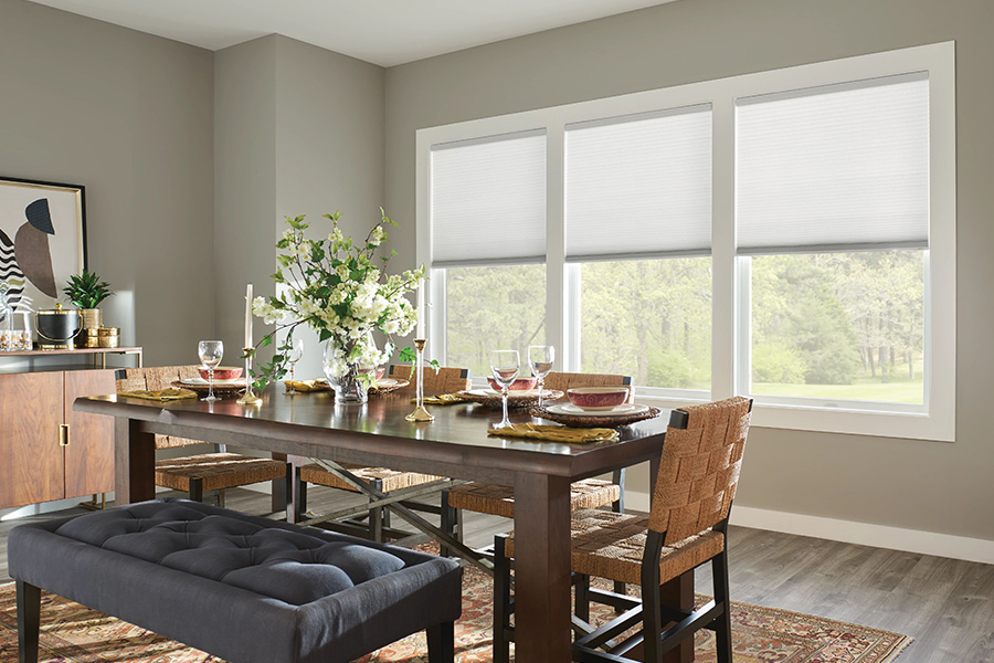 Cellular shades with small pleats fit shallow windows and add an interesting texture. White cellular shades on shallow dining room windows